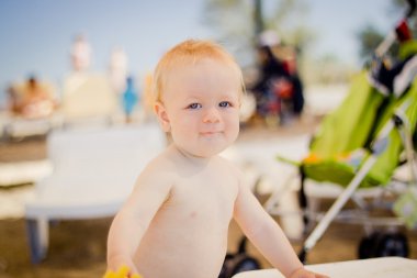 Baby on the beach clipart
