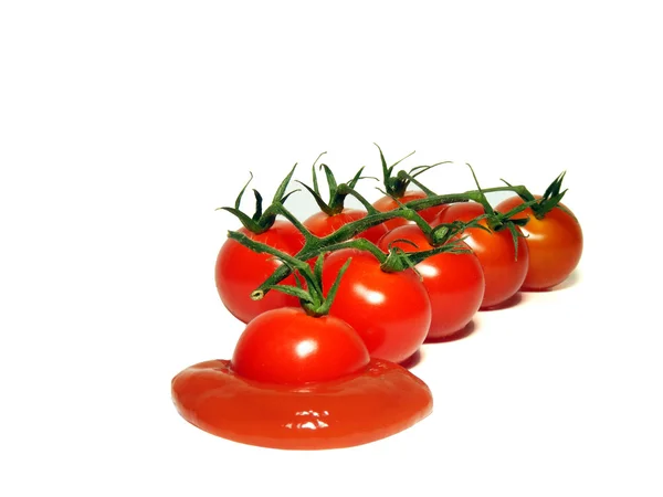 Tomates cherry y salsa de tomate Imágenes de stock libres de derechos