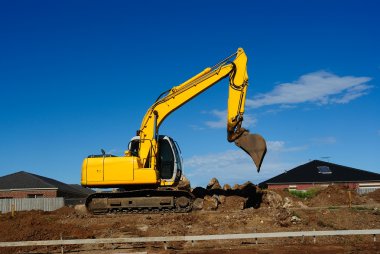 Yellow Excavator At Work clipart