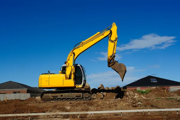 Excavadora amarilla en el trabajo —  Fotos de Stock