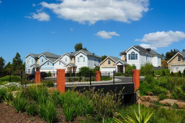 Row of bright town homes clipart