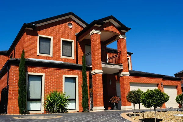 stock image Beautiful brand new brick home