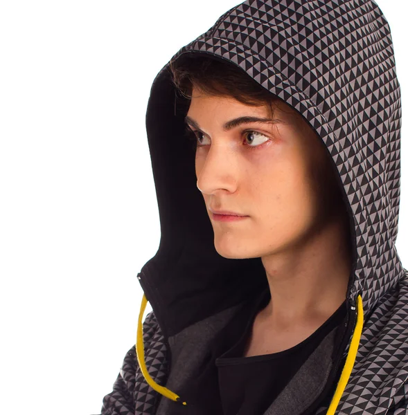 Serious young man standing and looking away with head covered wi — Stock Photo, Image