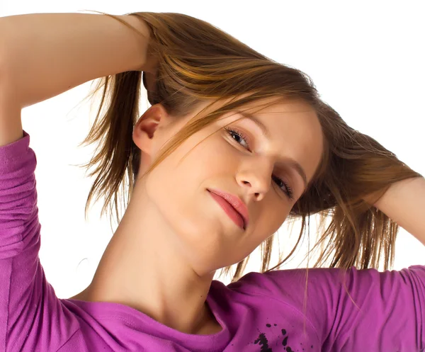 かなり若い女性彼女の髪と遊ぶ — ストック写真