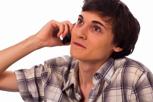 Young man having converstion by phone — Stock Photo, Image