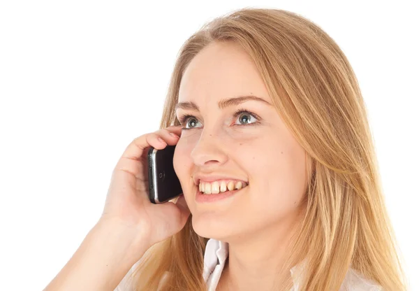 Young business woman smiling and holding phone — Stock Photo, Image