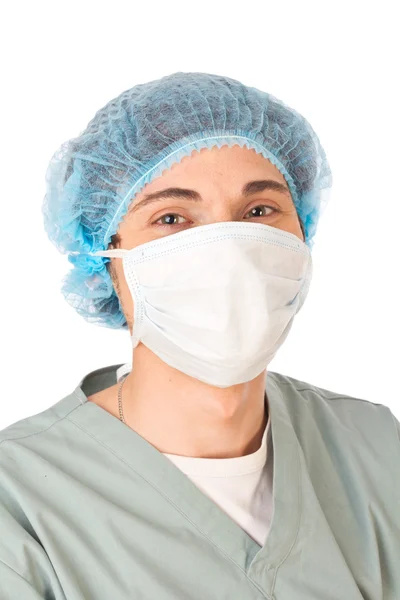 Щасливий молодий лікар в шапці і масці — стокове фото