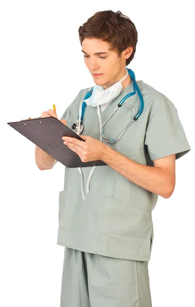 Young male doctor making notes — Stock Photo, Image