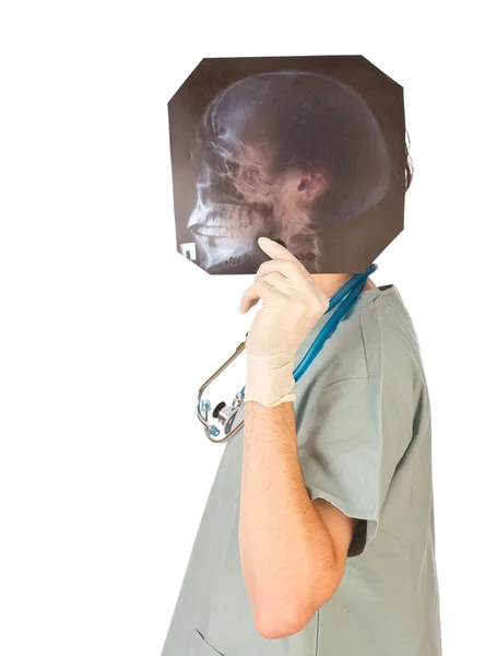 Young doctor hiding himself with x-ray — Stock Photo, Image