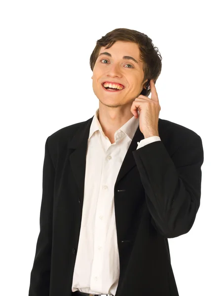 Młody biznesmen z zestawu słuchawkowego uśmiechający się — Zdjęcie stockowe