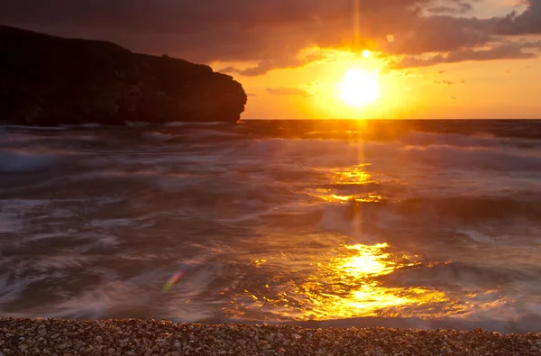 Beautiful shining sunset over the sea — Stock Photo, Image