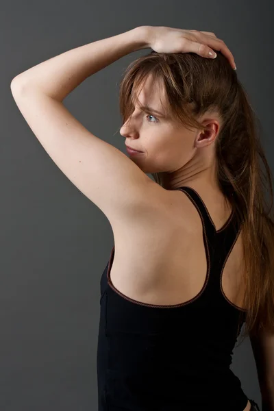 Jovem mulher fitness de costas — Fotografia de Stock