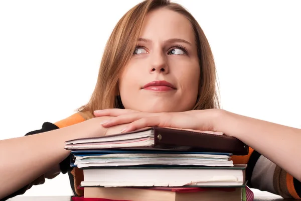 Young student girl with head on top of books pile — Stock Photo, Image