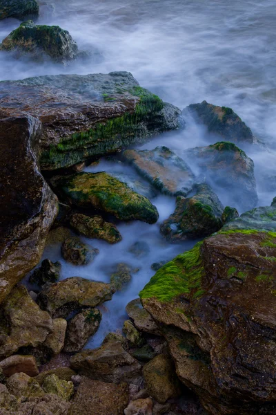 Stock image Rocky sea shore at the dusk