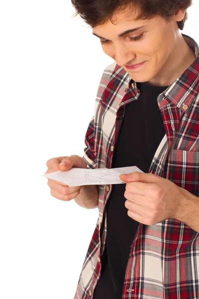 Young man ready fancy note and smiling — Stock Photo, Image