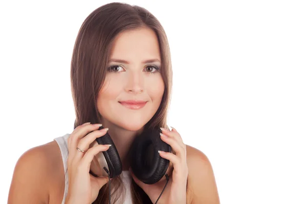 Potret close up gadis muda dengan headphone di tangan — Stok Foto