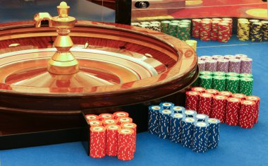 Casino - spinning roulette wheel with ball clipart