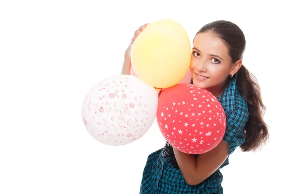 Прекрасна молода жінка з повітряними кулями на день народження — стокове фото