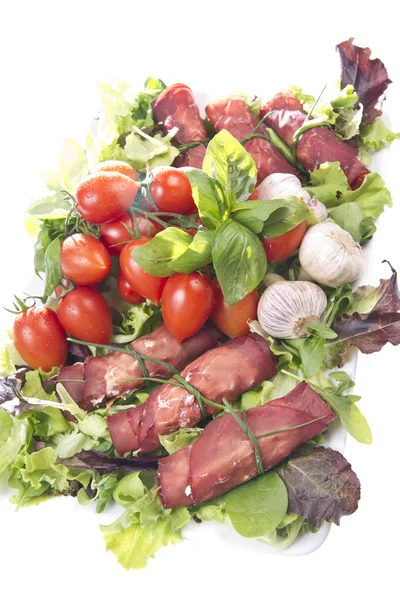 stock image Fresh bresaola rolls and mousse with vegetables