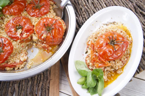Tomatoes stuffed with rice — Stock Photo, Image