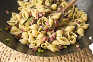 Orecchiette with bacon and peas clipart