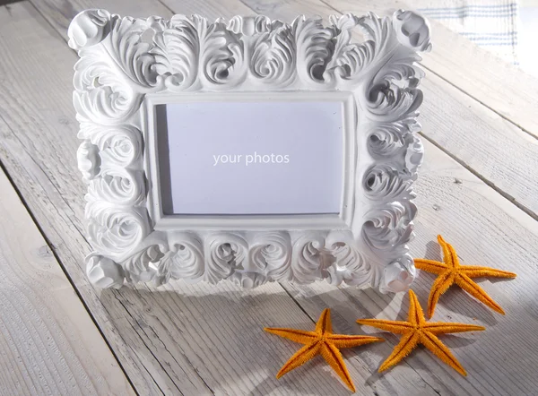 Blank photo frame and starfish — Stock Photo, Image