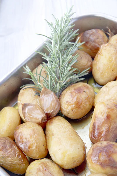 Baked Potatoes with rosemary — Stock Photo, Image