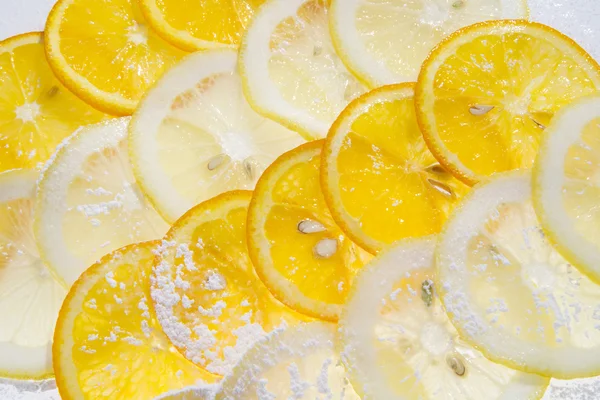 Slices of citrus fruits — Stock Photo, Image