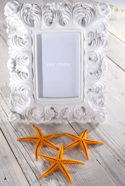 Blank photo frame and starfish — Stock Photo, Image