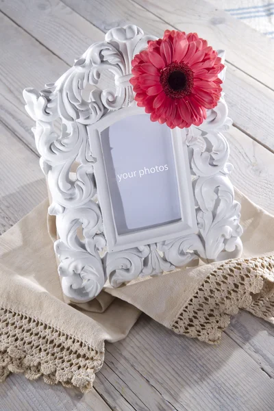 Blank photo frame and flower — Stock Photo, Image