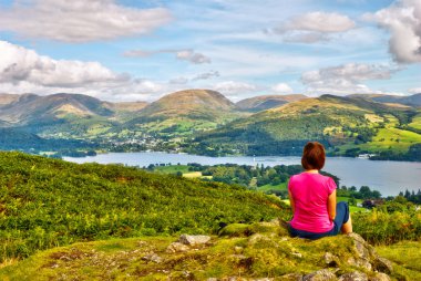 Female hiker overlooking Lake Windermere clipart