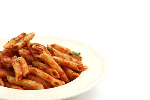 Pasta macaroni with tomato sauce isolated in white background — Stock Photo, Image