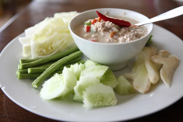 stock image Thai food soya bean dipping sauce in pork with vegetable on woo