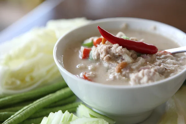 stock image Thai food soya bean dipping sauce in pork with vegetable on woo