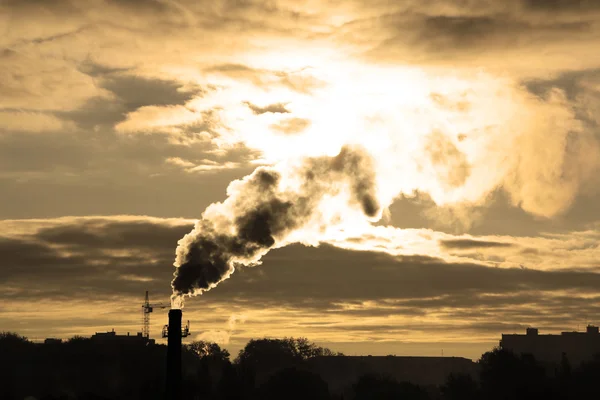 stock image Factory pipe's smoke and sun