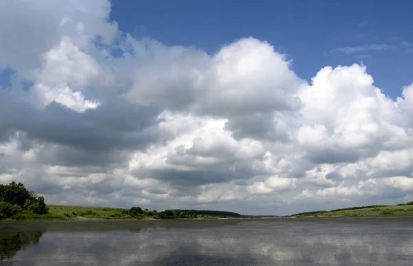 stock image Landscape with low clouds over lake