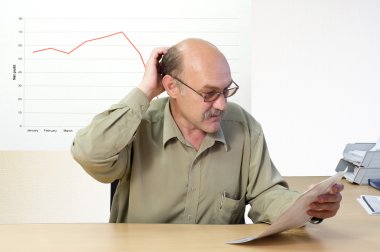 Manager looks at the financial account clipart