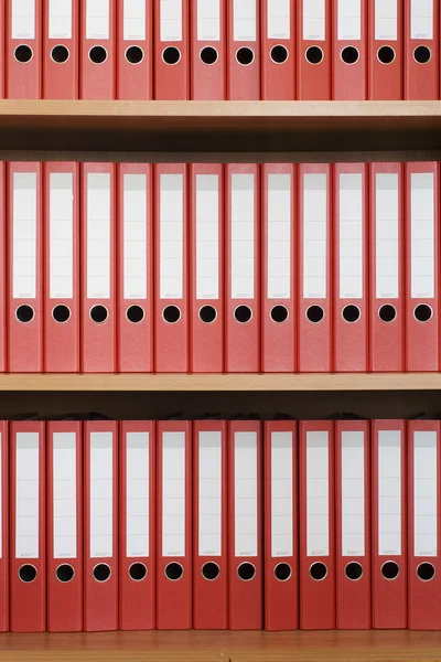 Rows of folders in the bookshelf — Stock Photo, Image