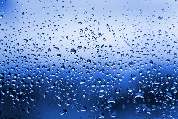 Blauwe waterdruppels condensatie — Stockfoto