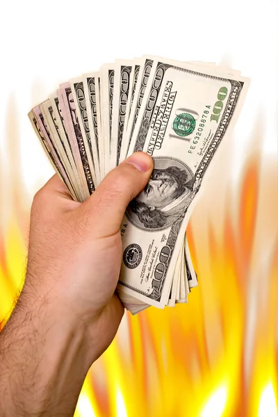 Огненные деньги — стоковое фото