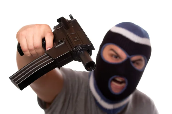 Terrorista apontando uma arma automática — Fotografia de Stock