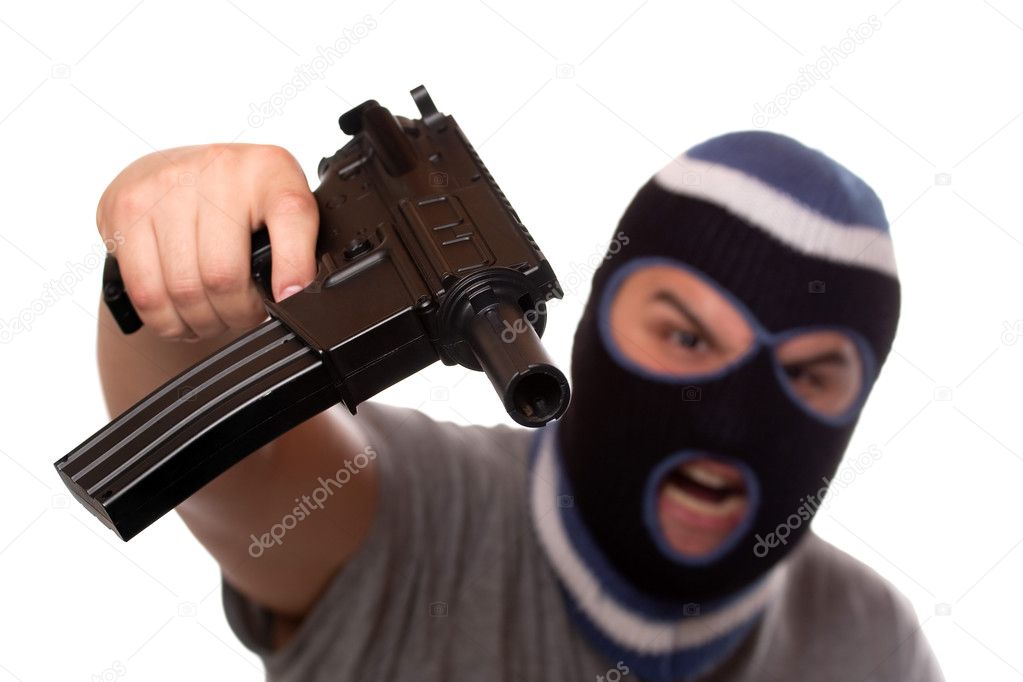 Terrorist Pointing an Automatic Weapon