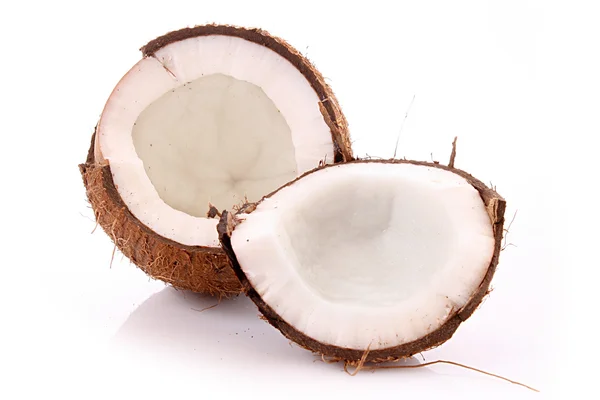 Duas metades de coco sobre fundo branco — Fotografia de Stock