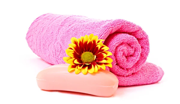 Soap, flower and towel on white — Stock Photo, Image