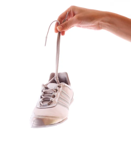 Πάνινα παπούτσια στο χέρι που απομονώνονται σε λευκό — Φωτογραφία Αρχείου