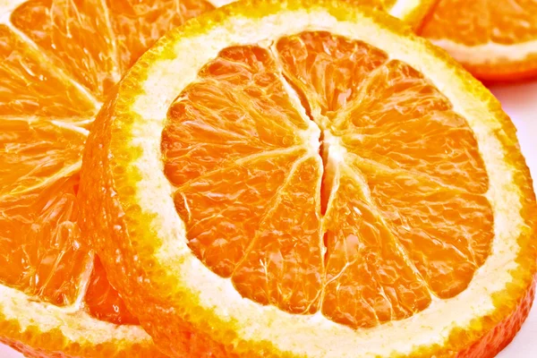 Много нарезанных апельсинов — стоковое фото