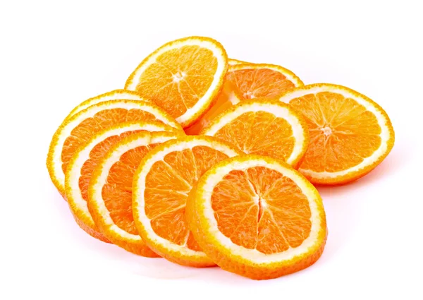 Många skivade apelsiner — Stockfoto