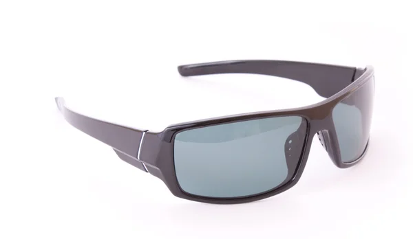 Солнечные очки поверх белых — стоковое фото