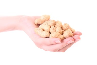 Peanuts in hand isolated on white