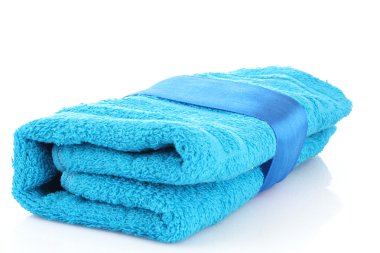 Folded blue towel with the band isolated on white